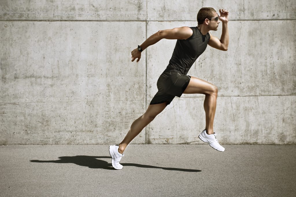Runner moving with a high knee drive